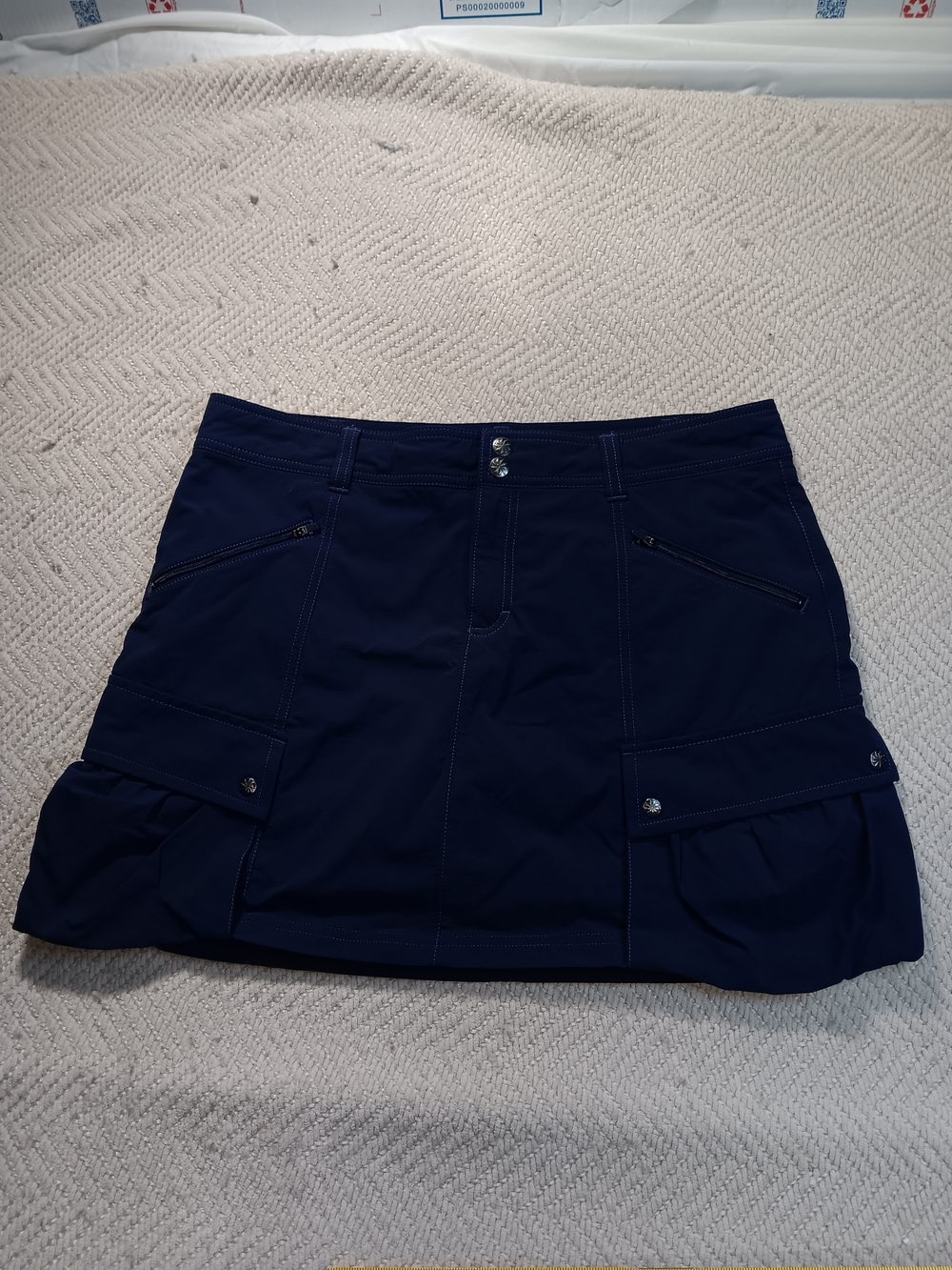 Athleta Navy Trekkie Skort with Zip and Botton Flap Pockets